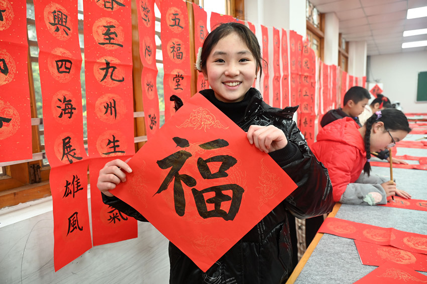 墨香送祝福。蘭自濤攝